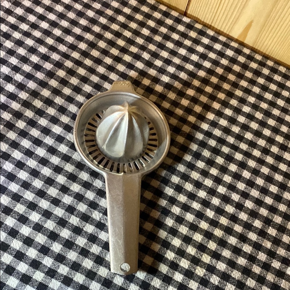 Silver Metal Citrus Juicer